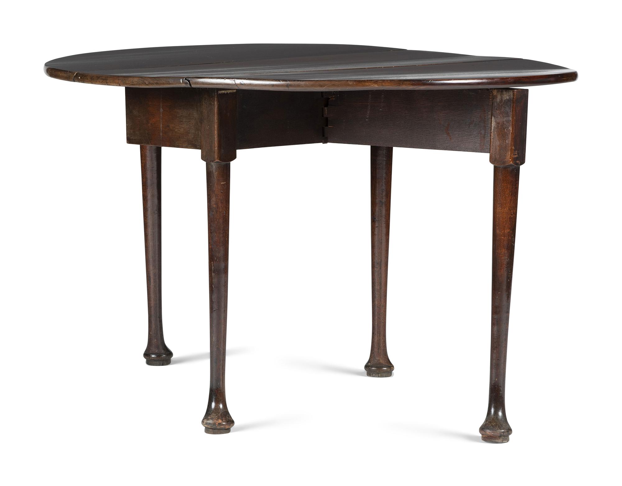 A George III Carved Mahogany Drop-Leaf Table