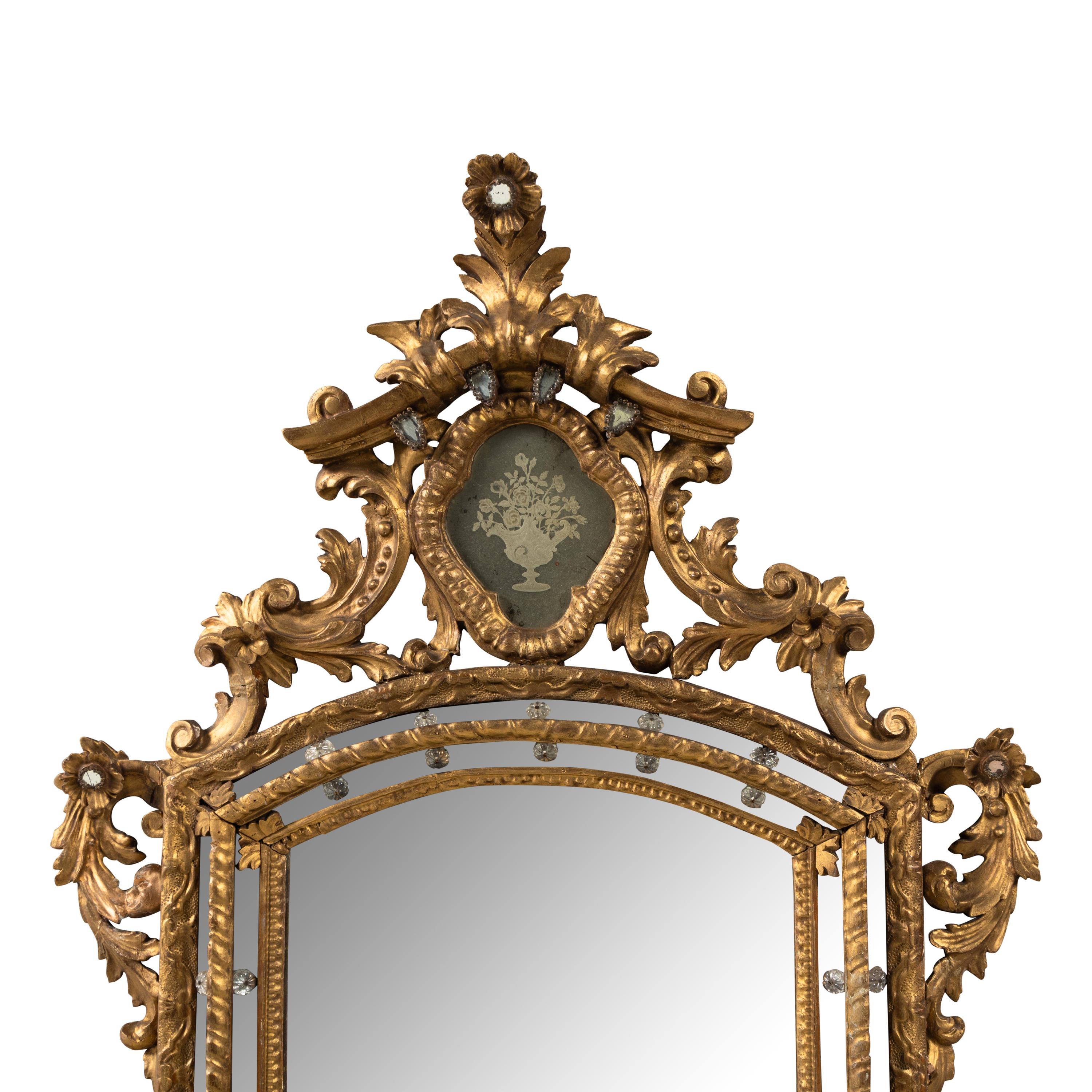 A Venetian Giltwood and Etched Glass Mirror