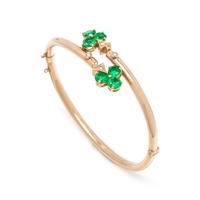 YELLOW GOLD, GREEN ASSEMBLED STONE AND DIAMOND BANGLE BRACELET