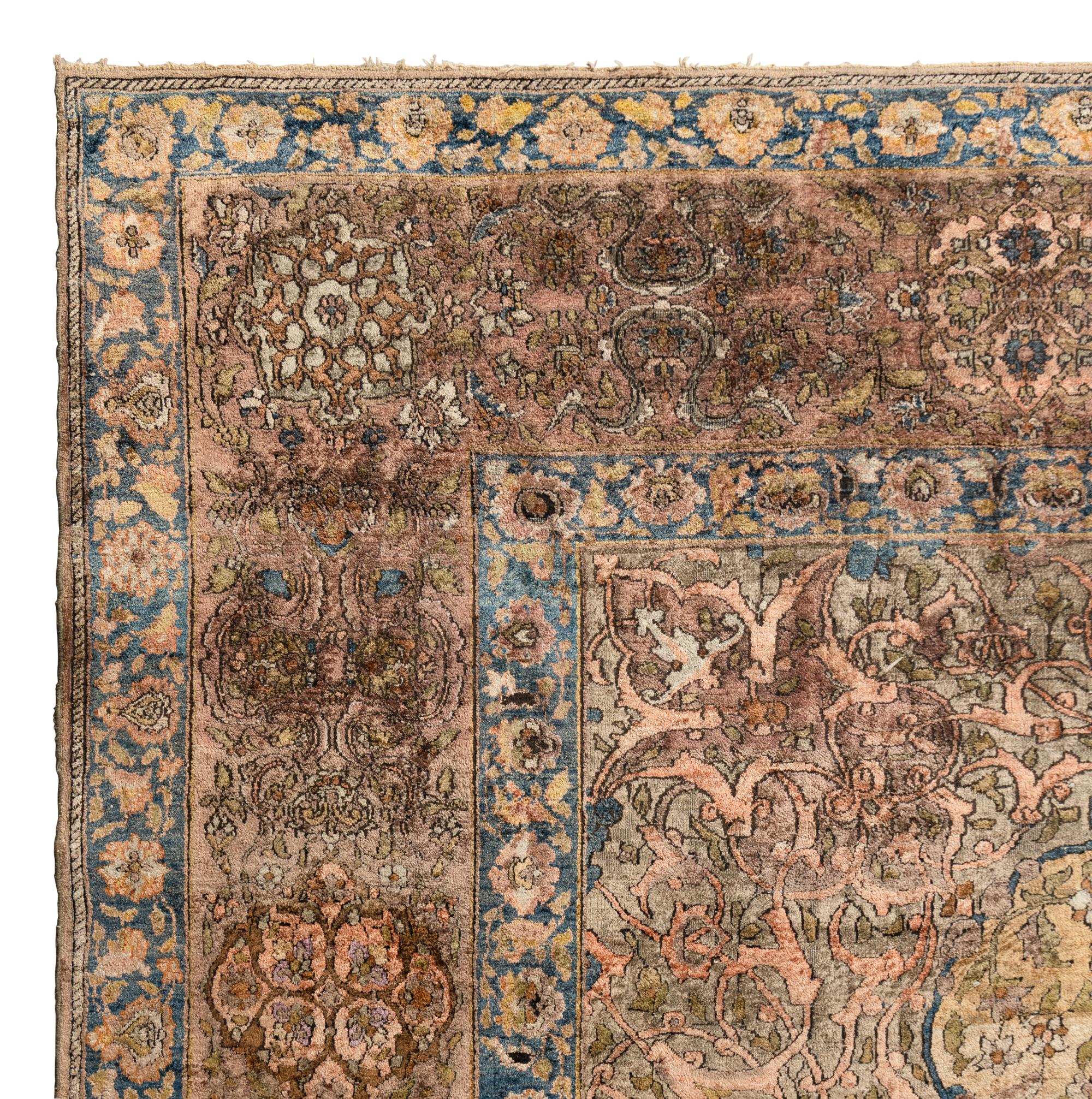 A Kashan Silk Carpet