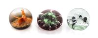 Caithness, SCOTLAND, a group of three glass paperweights