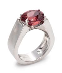 An 18 Karat White Gold, Red-Orange Sapphire and Diamond Ring, Cartier, Circa 1999,