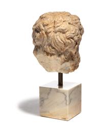 A Roman Marble Head of a Bearded Male, Perhaps Hercules