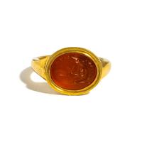 A Roman Carnelian Ring Stone with the God Mercury and a Sheep — Set in a gold ring
