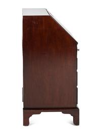 A Chippendale Figured and Shell-Carved Mahogany Slant Front Desk
