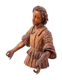 An Italian Carved Wood Figure of a Boy