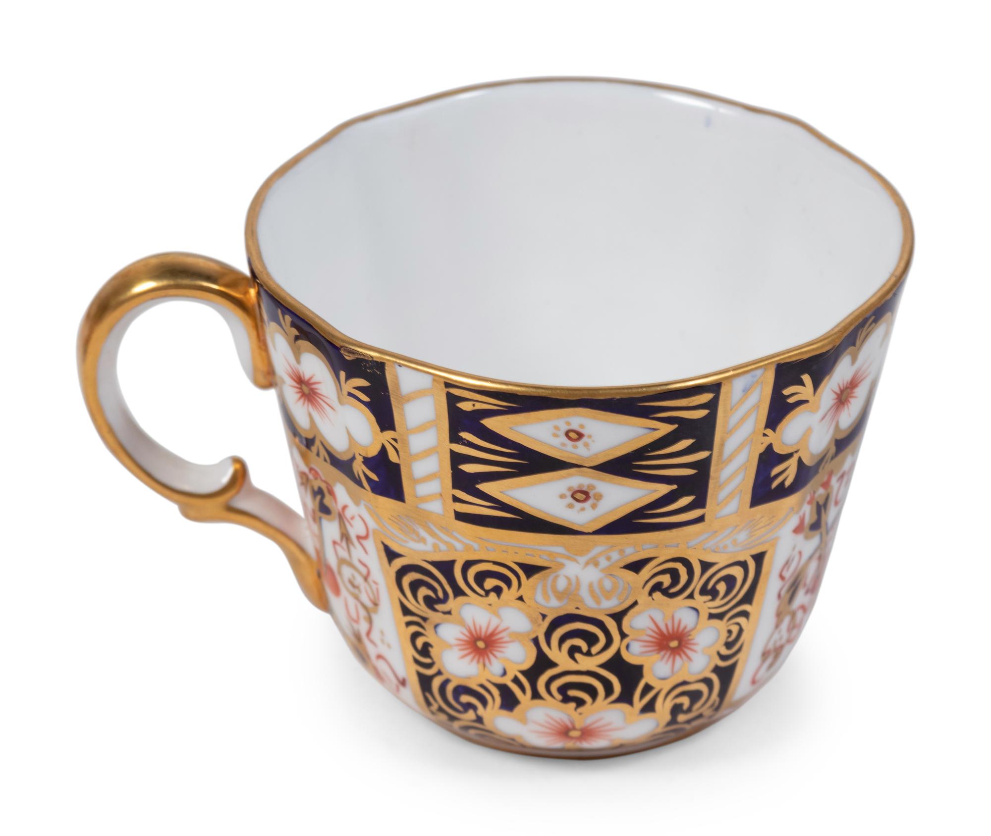 A Royal Crown Derby Porcelain Dinner Service