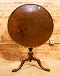A Georgian Style Mahogany Tilt Top Tea Table Height 27 3/4 x diameter 30 inches. — 20TH CENTURY