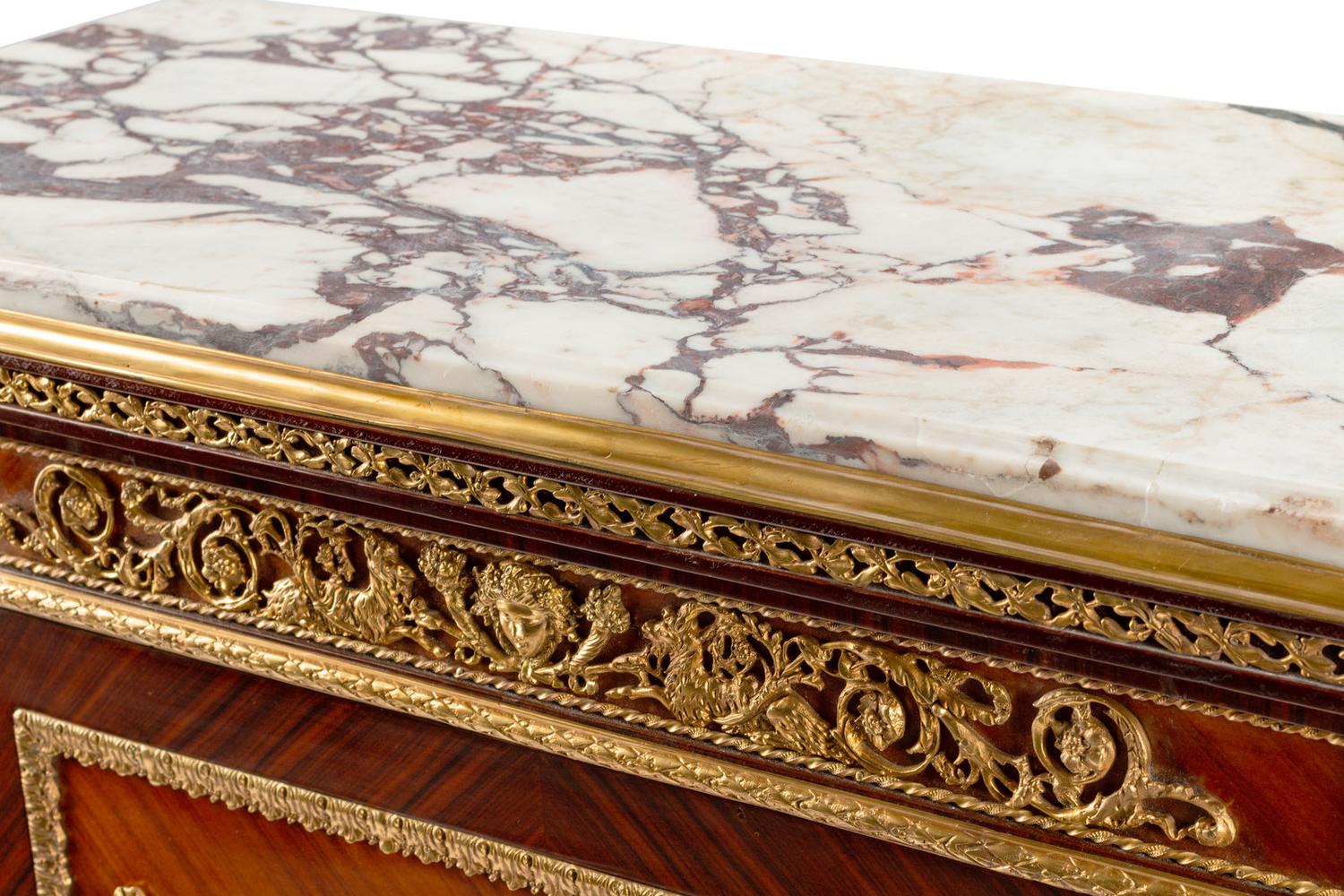 A Louis XVI Style Gilt Bronze Mounted Kingwood and Rosewood Cabinet