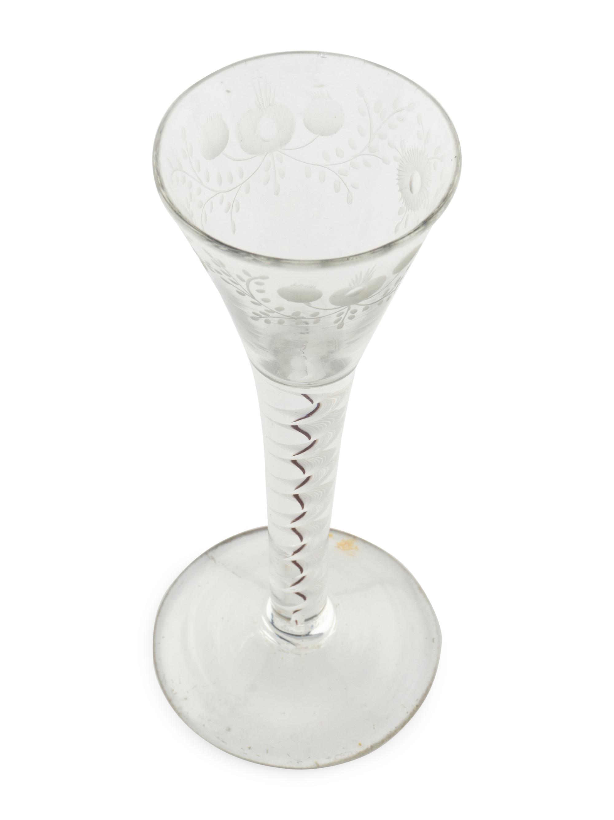 An English Color-Twist and Cut Glass Wine Stem