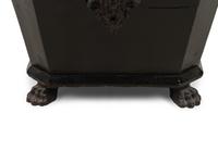 An Egyptian Revival Ebonized Coal Hod