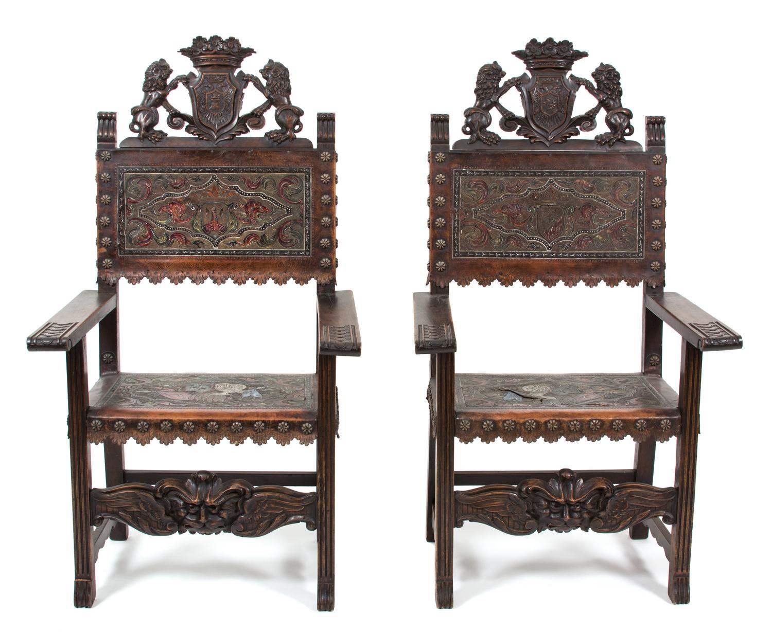 A Pair of Renaissance Revival Carved Oak Armchairs Height 53 inches. — 19TH CENTURY