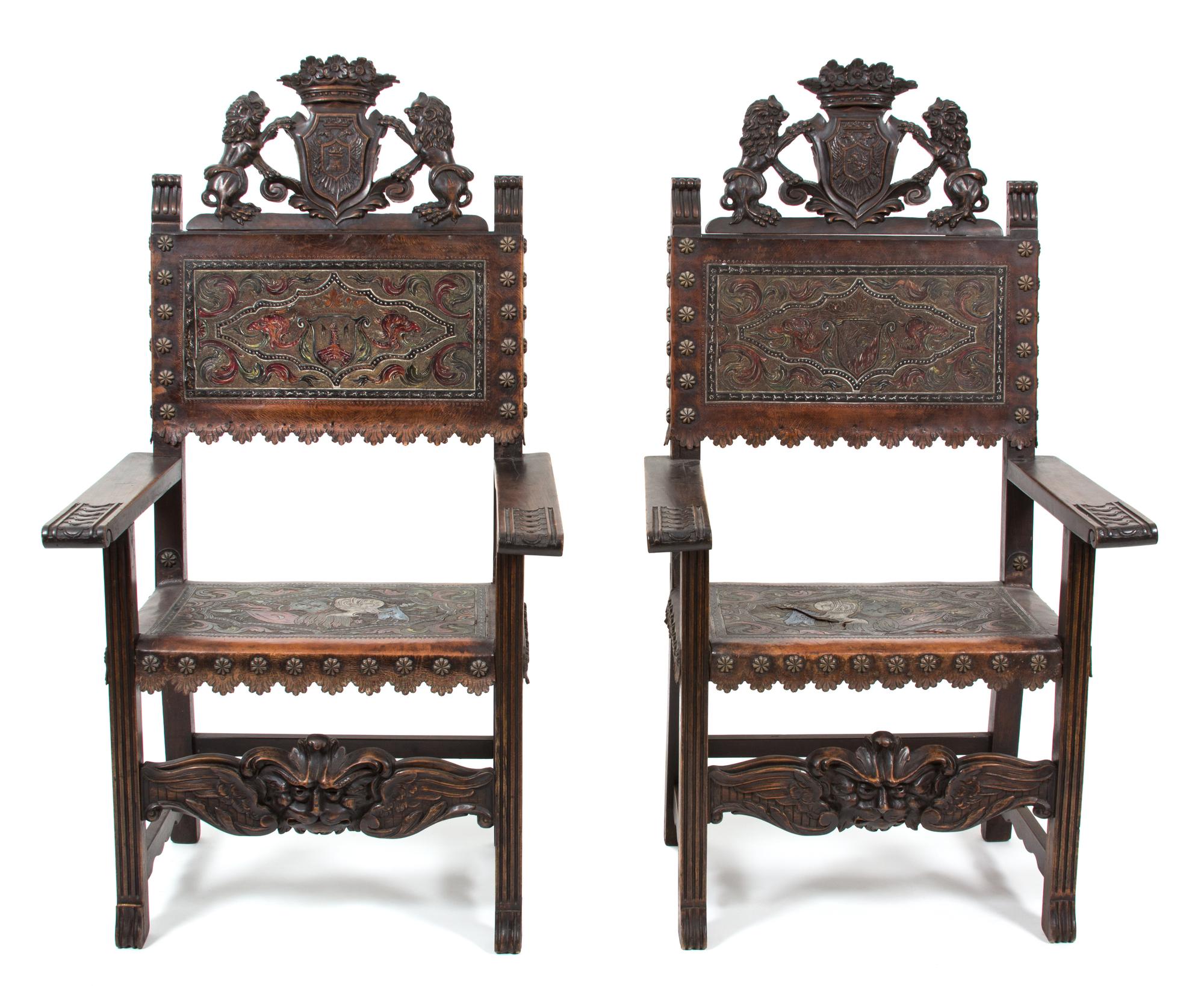 A Pair of Renaissance Revival Carved Oak Armchairs Height 53 inches. — 19TH CENTURY