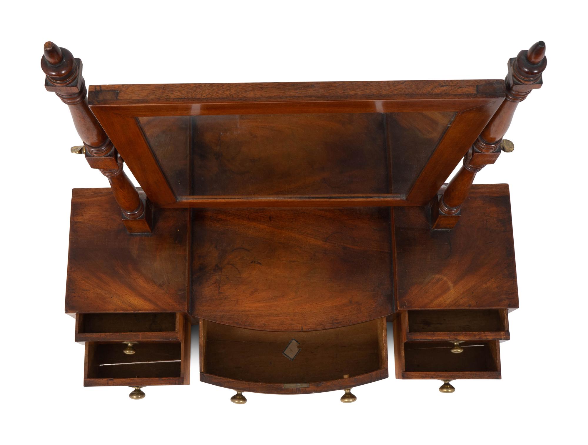 A Regency Crotch Mahogany Shaving Mirror on Stand — EARLY 19TH CENTURY