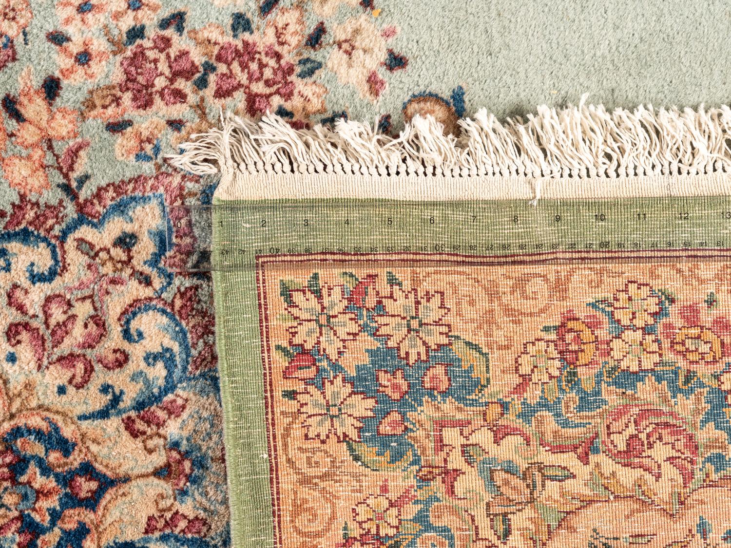 A Kirman Wool Rug
