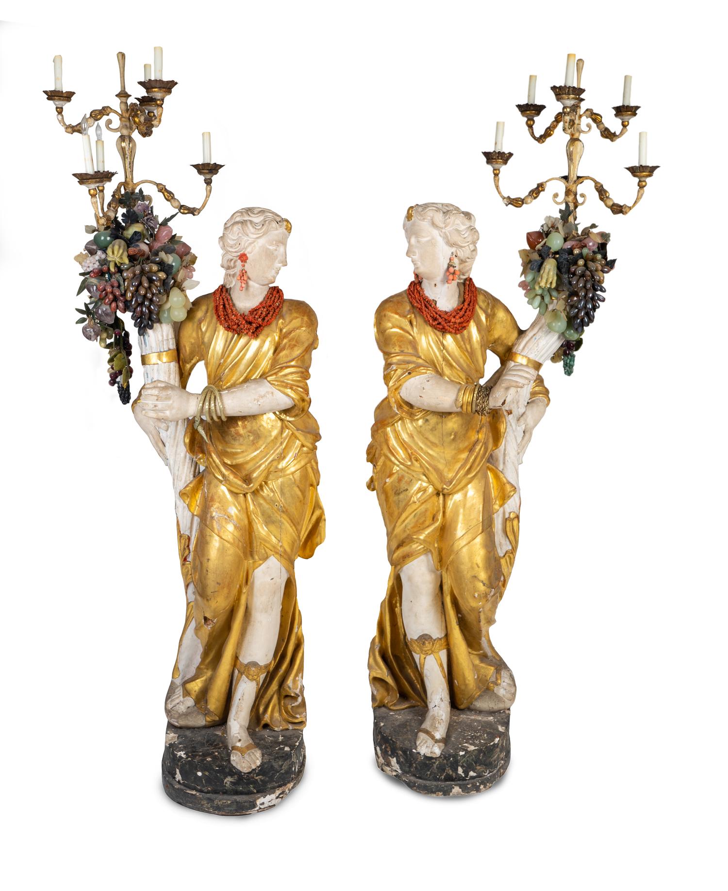 A Pair of Italian Baroque Style Parcel-Gilt and Carved Wood and Gesso Figural Candelabra — 19TH CENTURY