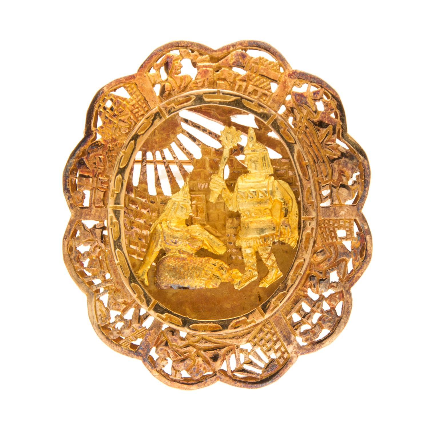 An 18 Karat Gold Brooch/Pendant, 17.70 dwts.
