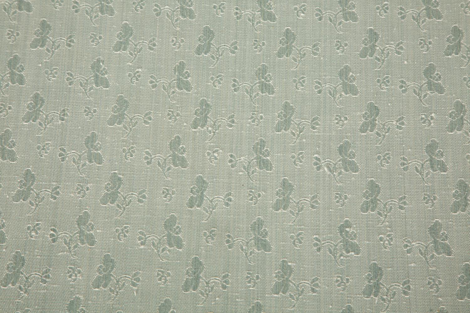 A Pale Blue Upholstered Club Chair with Matching Ottoman