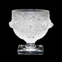 A Lalique Molded and Frosted Glass Vase Height 5 1/4 inches.