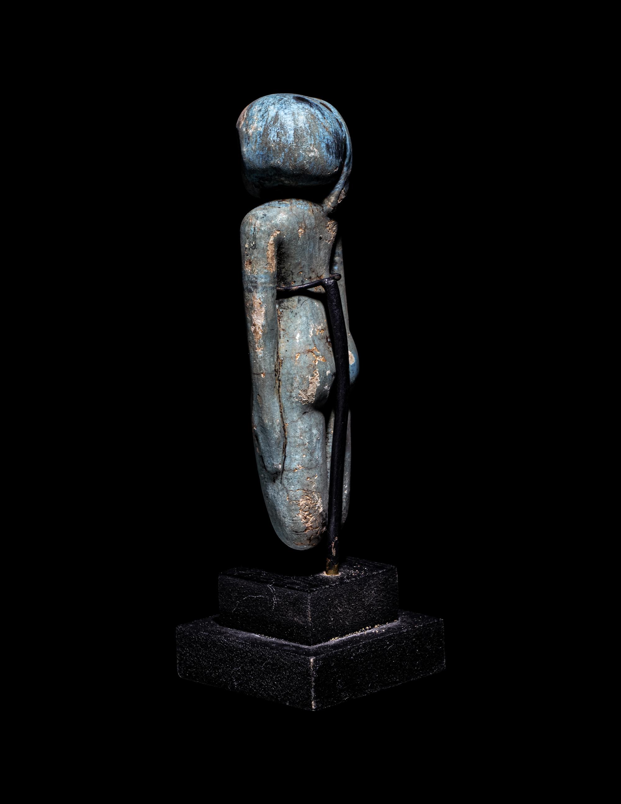 An Egyptian Faience Female Figure
