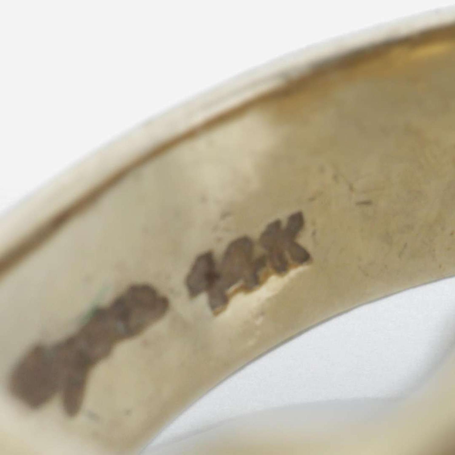 A 14K Yellow Gold and Diamond Ring by Mayors