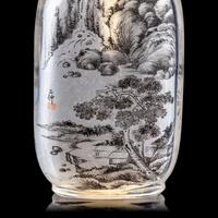 An Inside Painted Glass "Landscape" Snuff Bottle, Signed Ding Erzhong, dated winter of guiji year (1893)