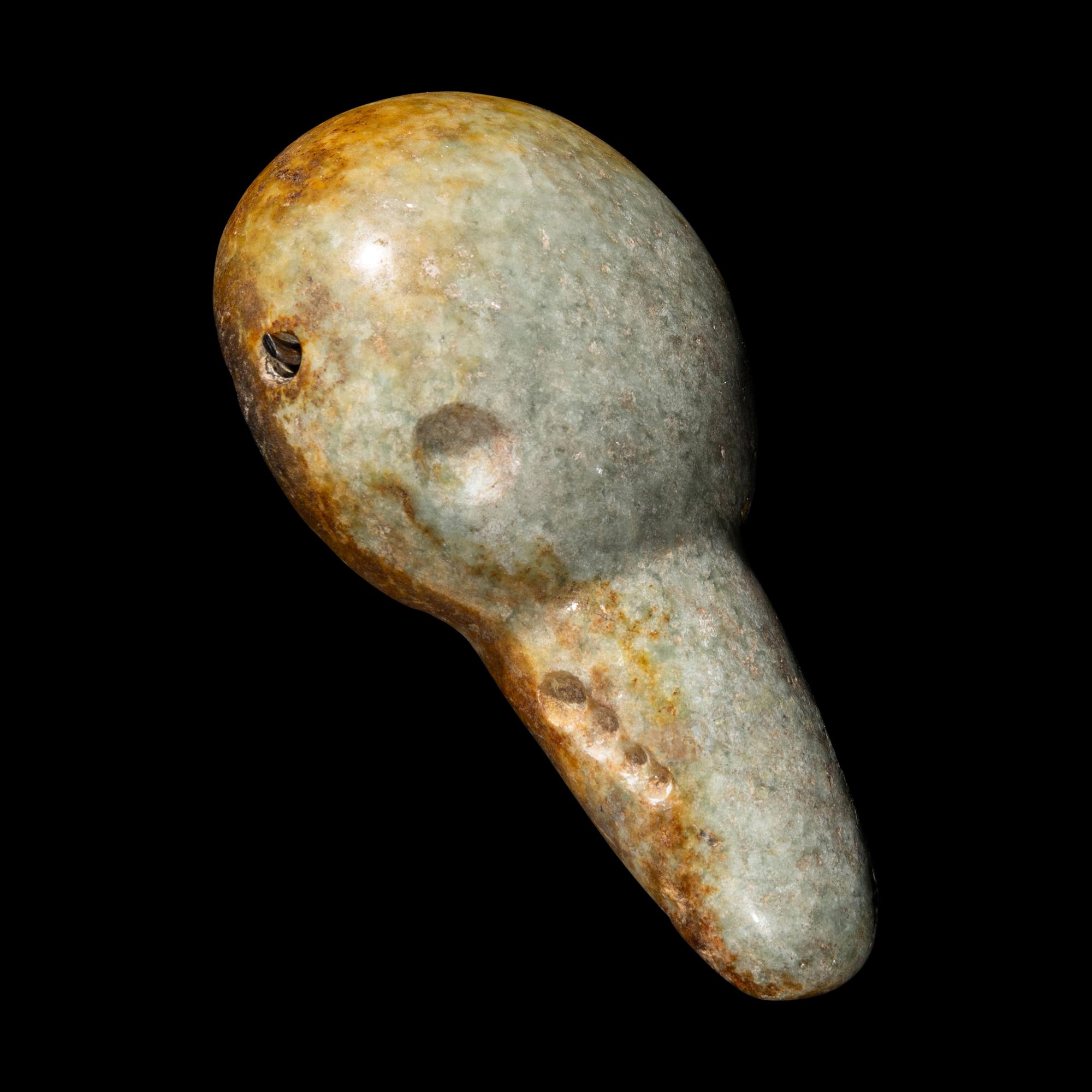 An Olmec Jade Pendant