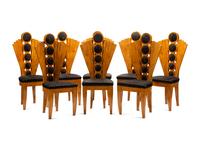 A Set of Eight Art Deco Style Dining Chairs