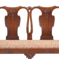 A George II Carved Mahogany Double Chair-Back Settee