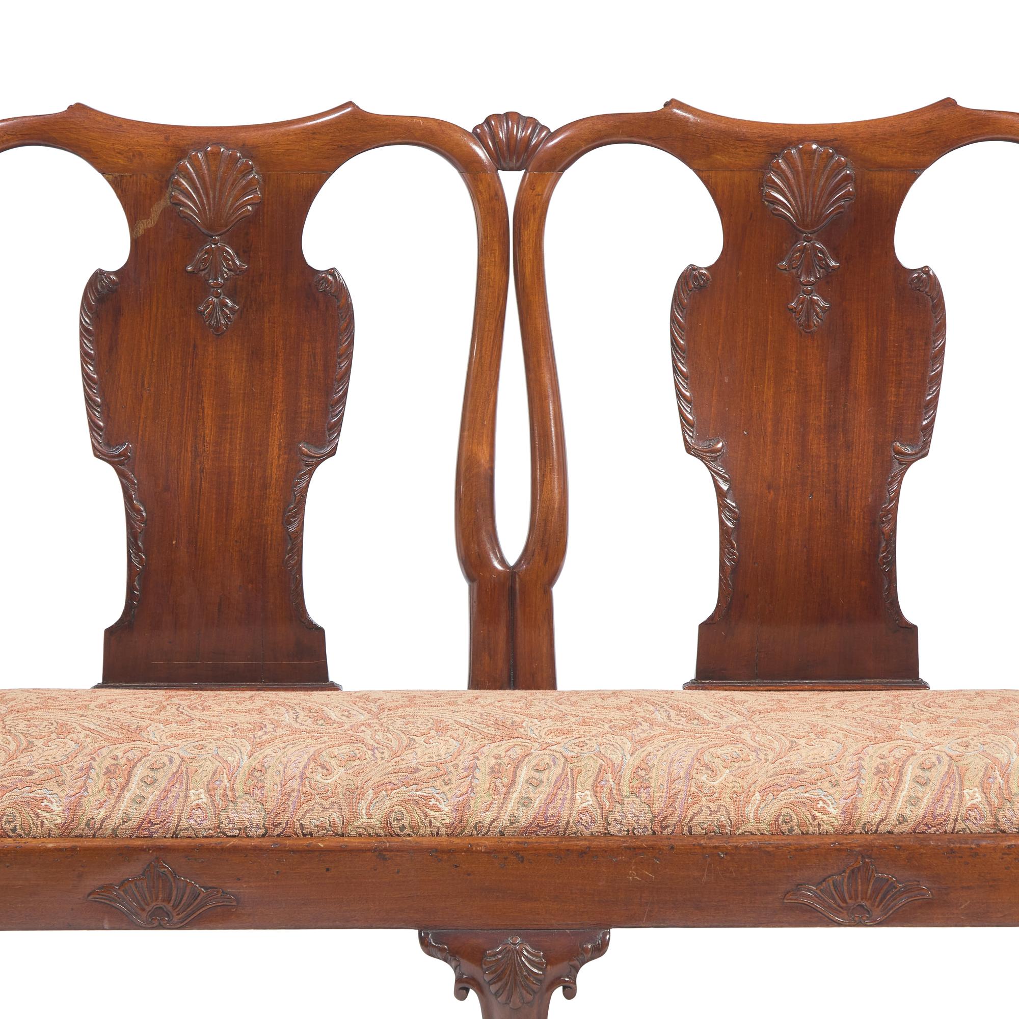 A George II Carved Mahogany Double Chair-Back Settee