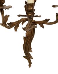 A Pair of Louis XV Style Gilt Bronze Three-Light Sconces
