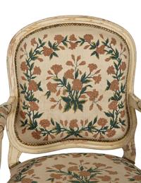 A Pair of Louis XVI Cream Painted Fauteuils