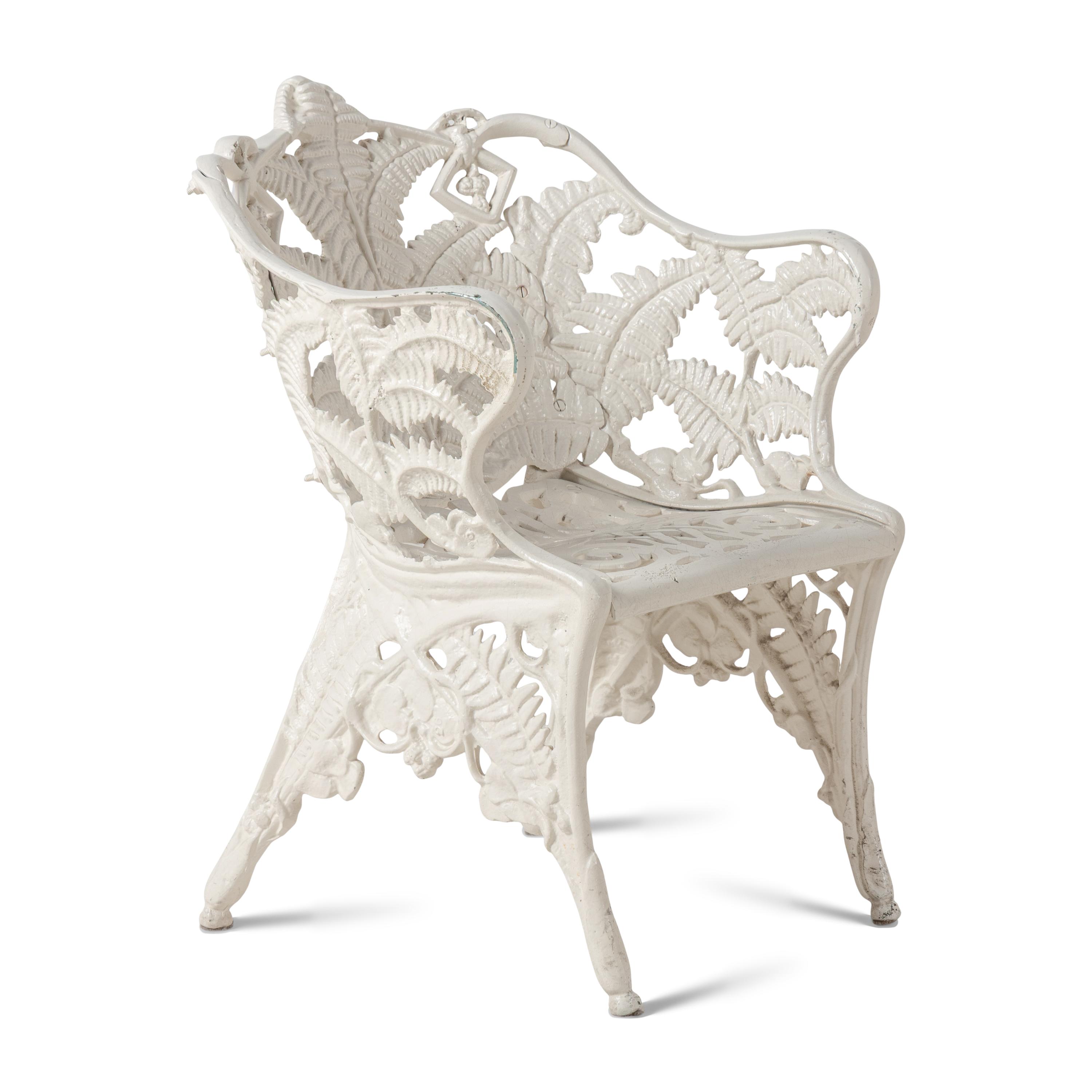 A Four-Piece Cast Iron Garden Seating Suite