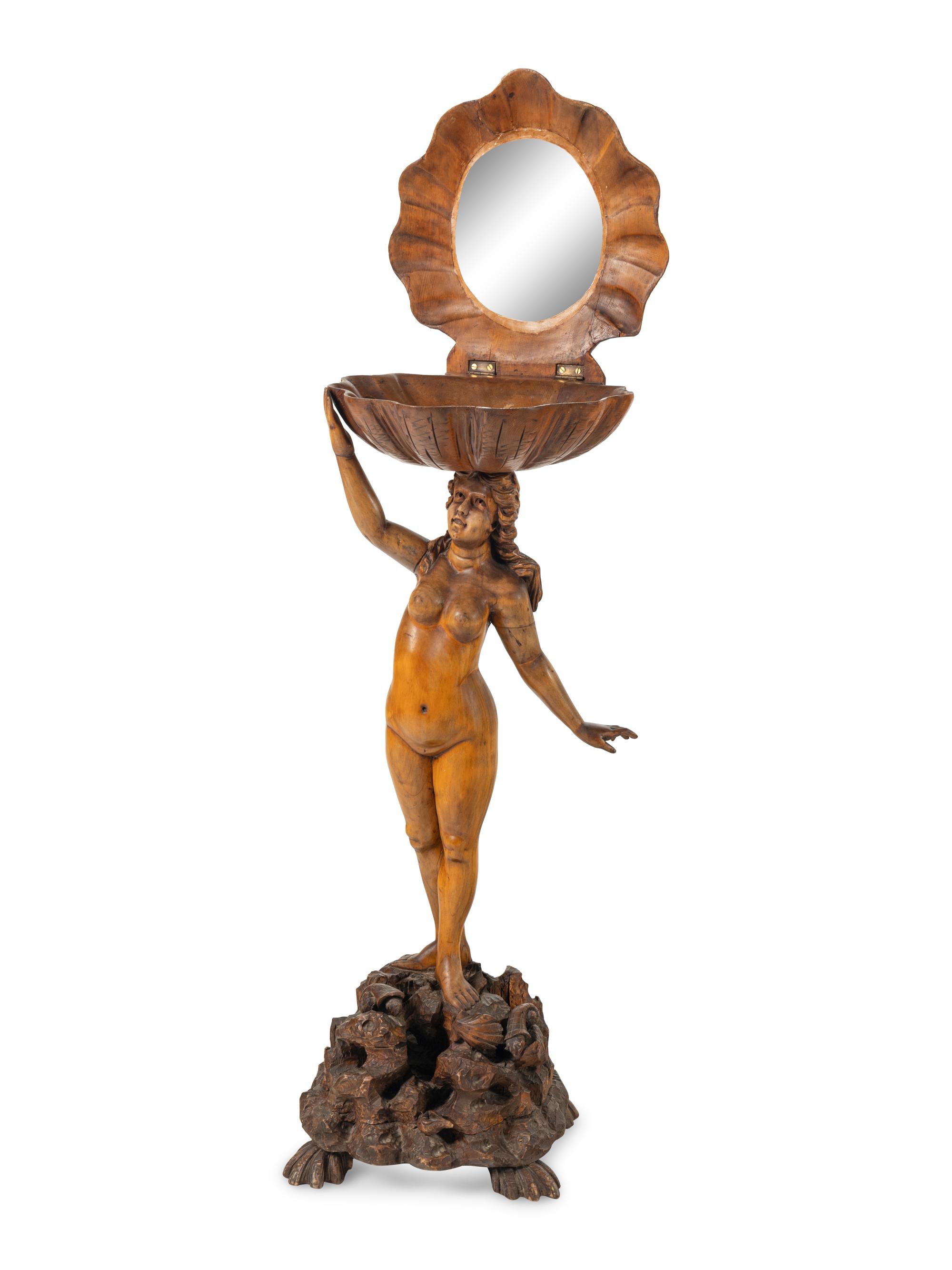 A Venetian Carved Walnut Figural Dressing Stand