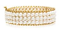 A Yellow Gold and Cultured Pearl Bangle Bracelet, 24.50 dwts.