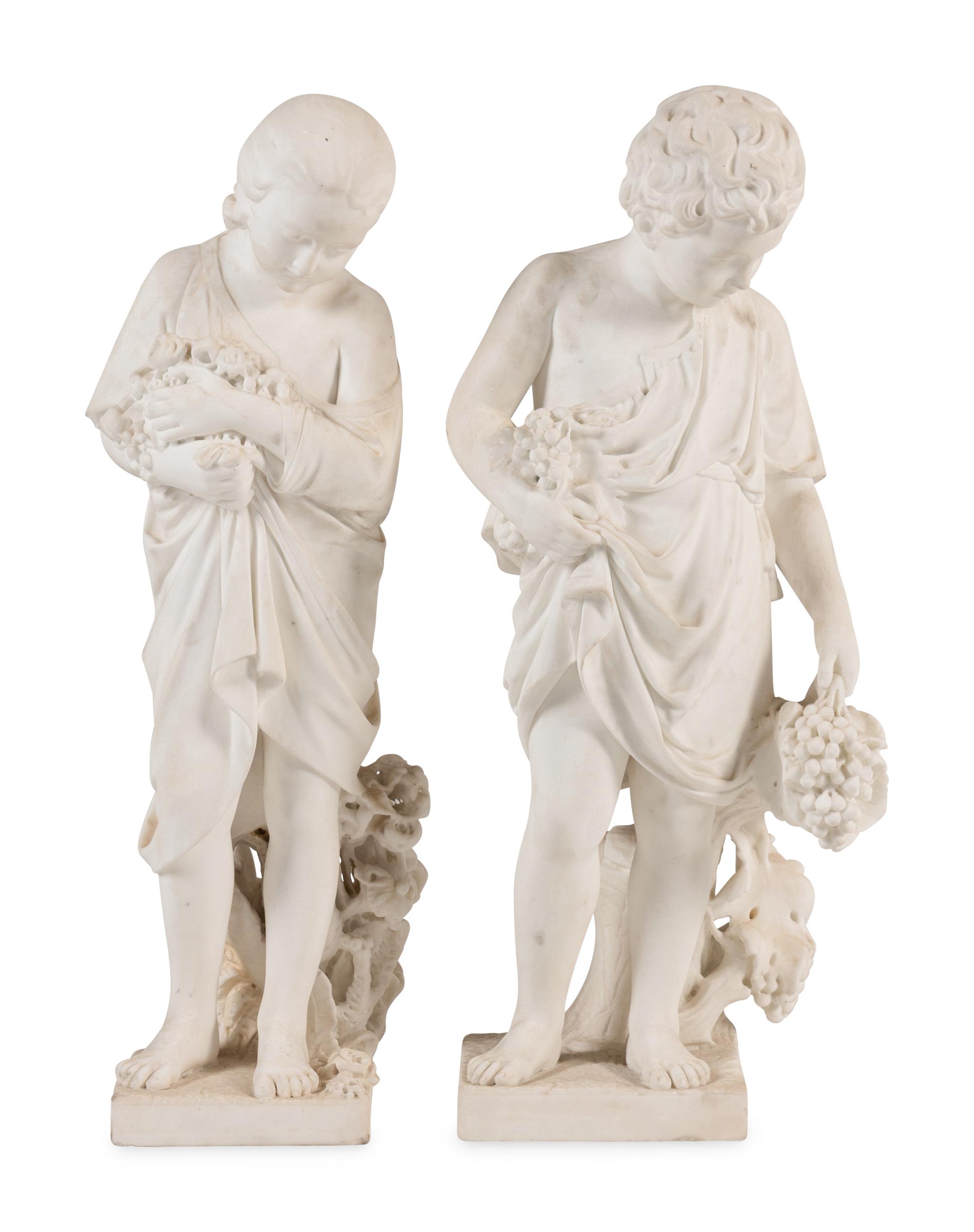 A Pair of Italian Carved Marble Figures of a Boy and Girl