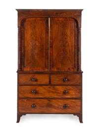 A George III Carved and Figured Mahogany Linen Press