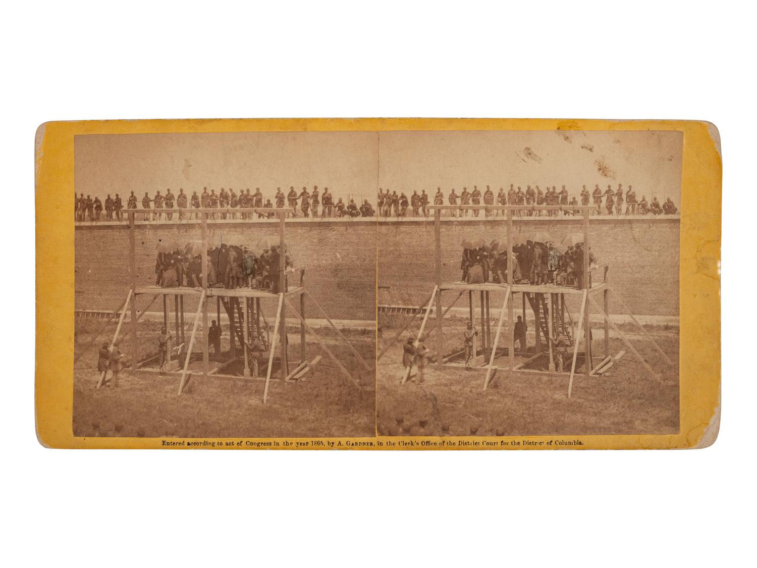 [LINCOLN ASSASSINATION]. GARDNER, Alexander (1821-1882), photographer. Pair of stereoviews of the Execution of the Conspirators. Washington: Philp & Solomons, ca 1865.