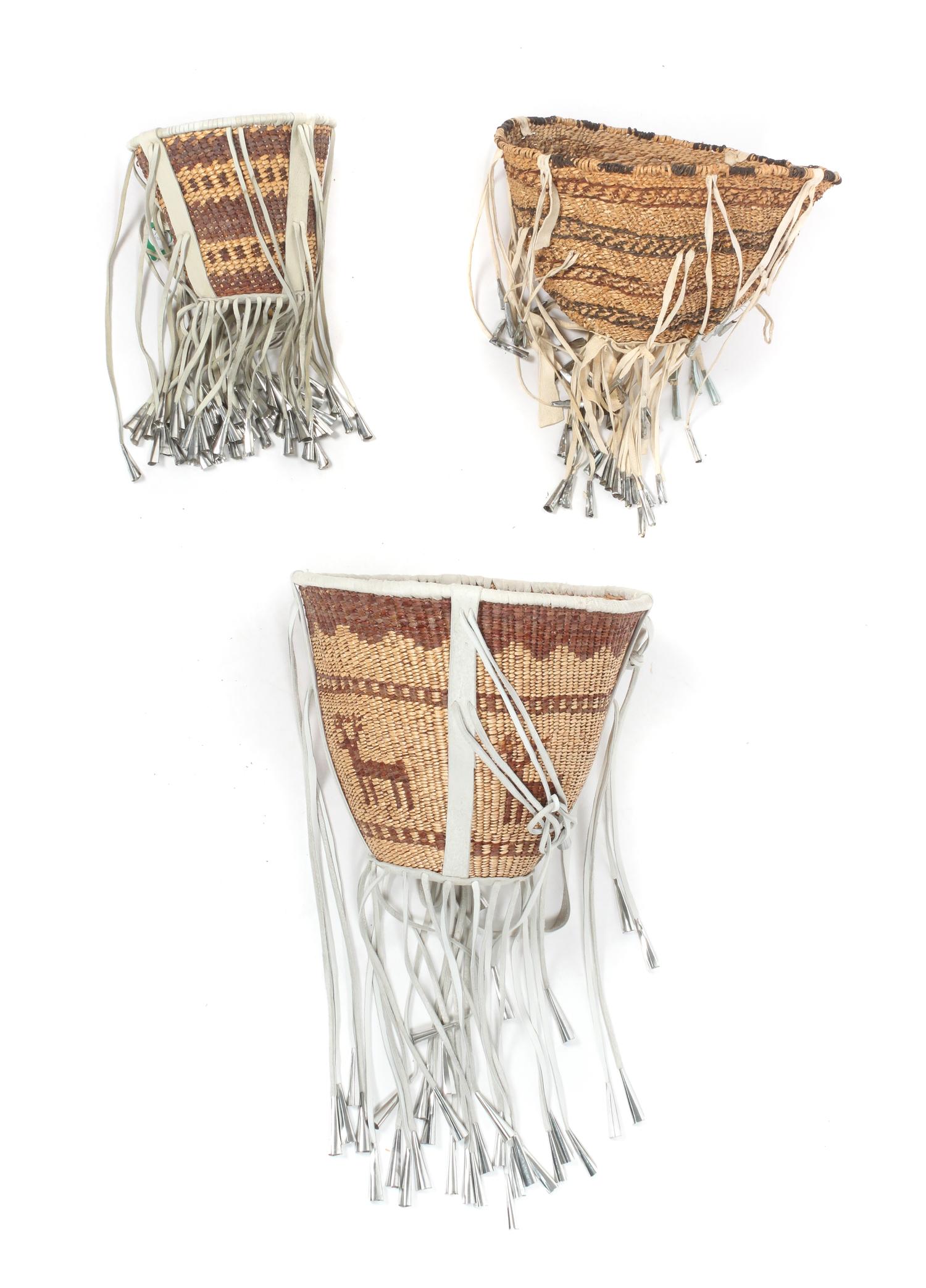Seven Apache Gathering Baskets Height of largest 16 x diameter 16 1/2 inches.
