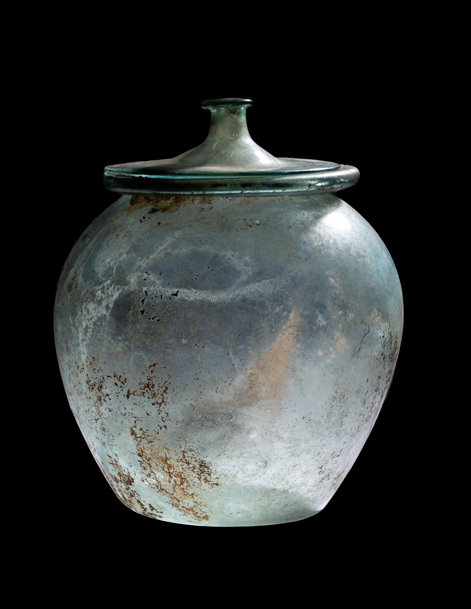 A Roman Blue-Green Glass Cinerary Urn