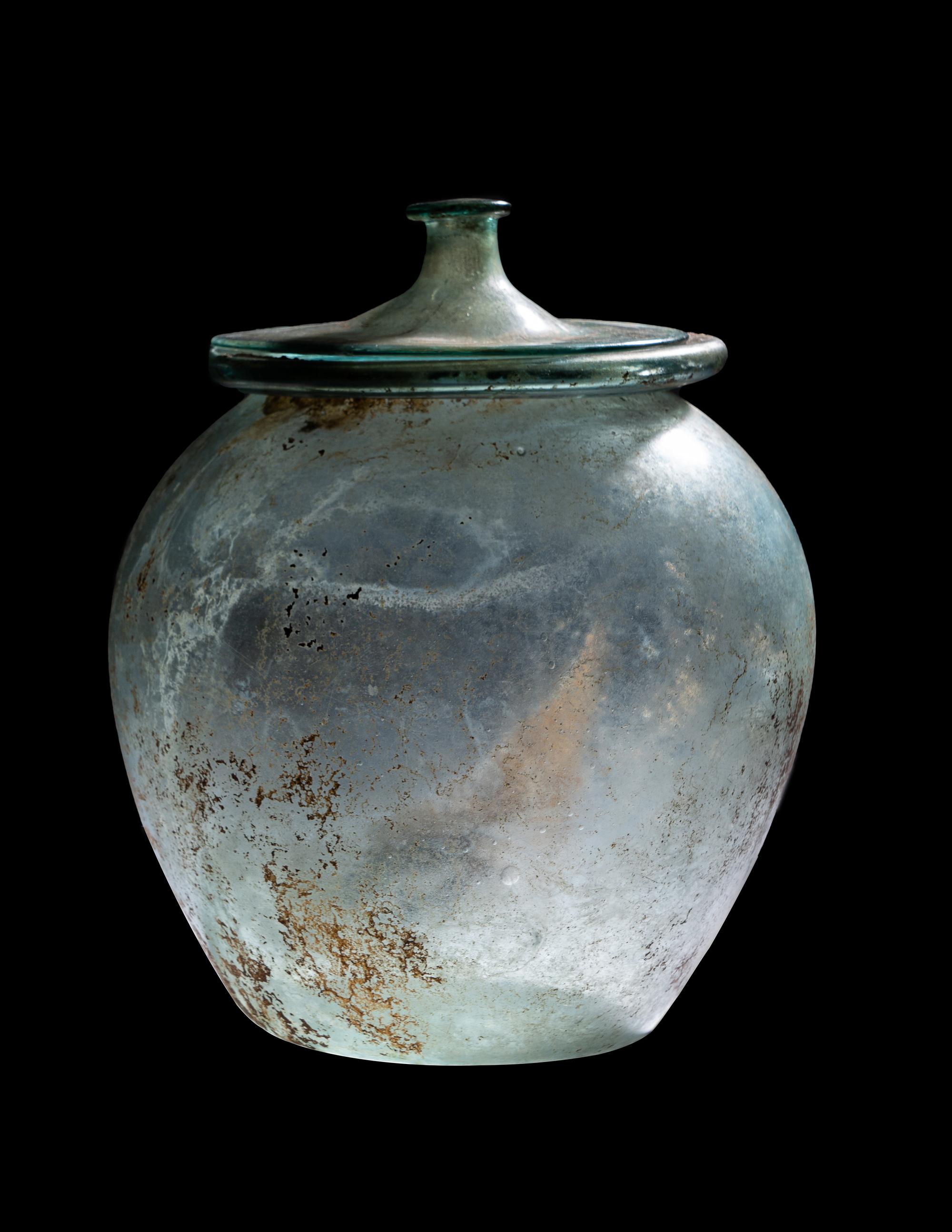 A Roman Blue-Green Glass Cinerary Urn