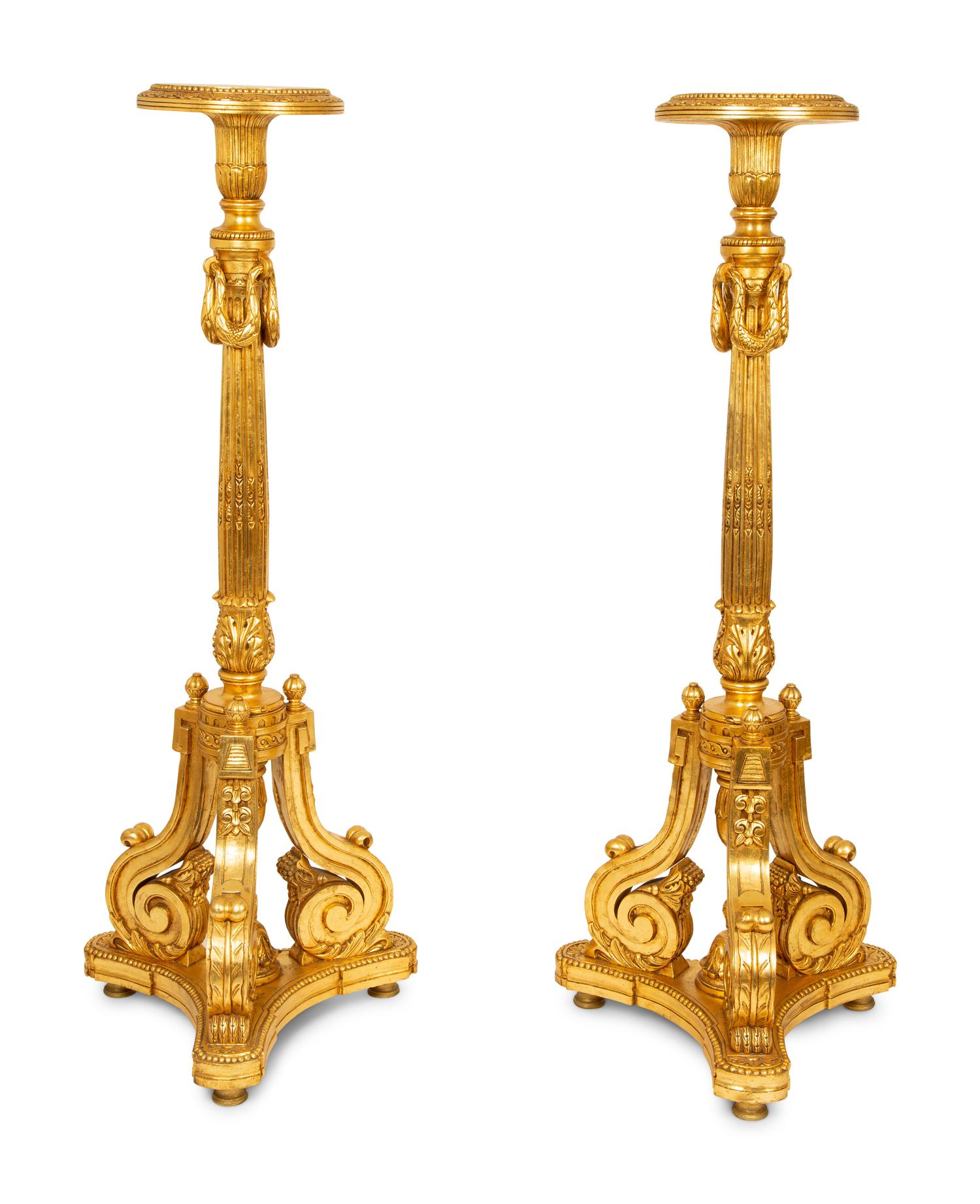 A Pair of Louis XVI Style Giltwood Torcheres — 20TH CENTURY
