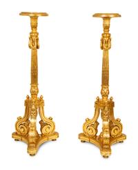 A Pair of Louis XVI Style Giltwood Torcheres — 20TH CENTURY