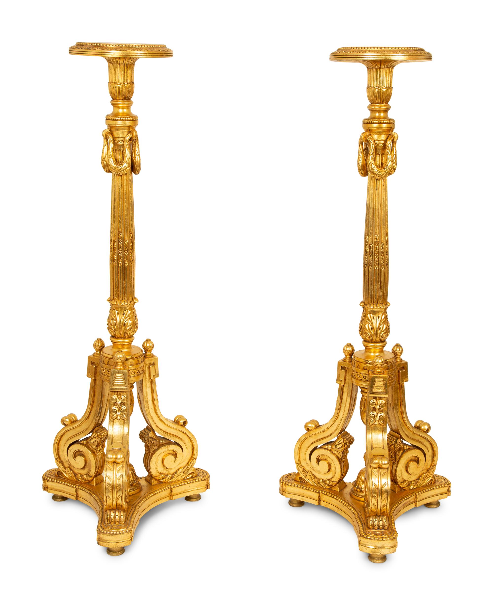 A Pair of Louis XVI Style Giltwood Torcheres — 20TH CENTURY