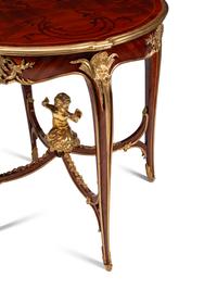 A Pair of Louis XV Style Gilt Bronze Mounted Marquetry Side Tables