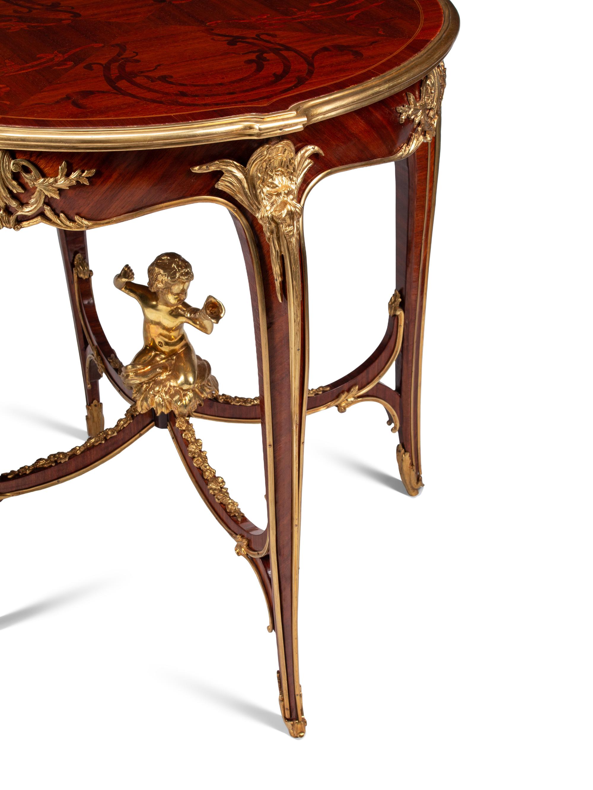 A Pair of Louis XV Style Gilt Bronze Mounted Marquetry Side Tables