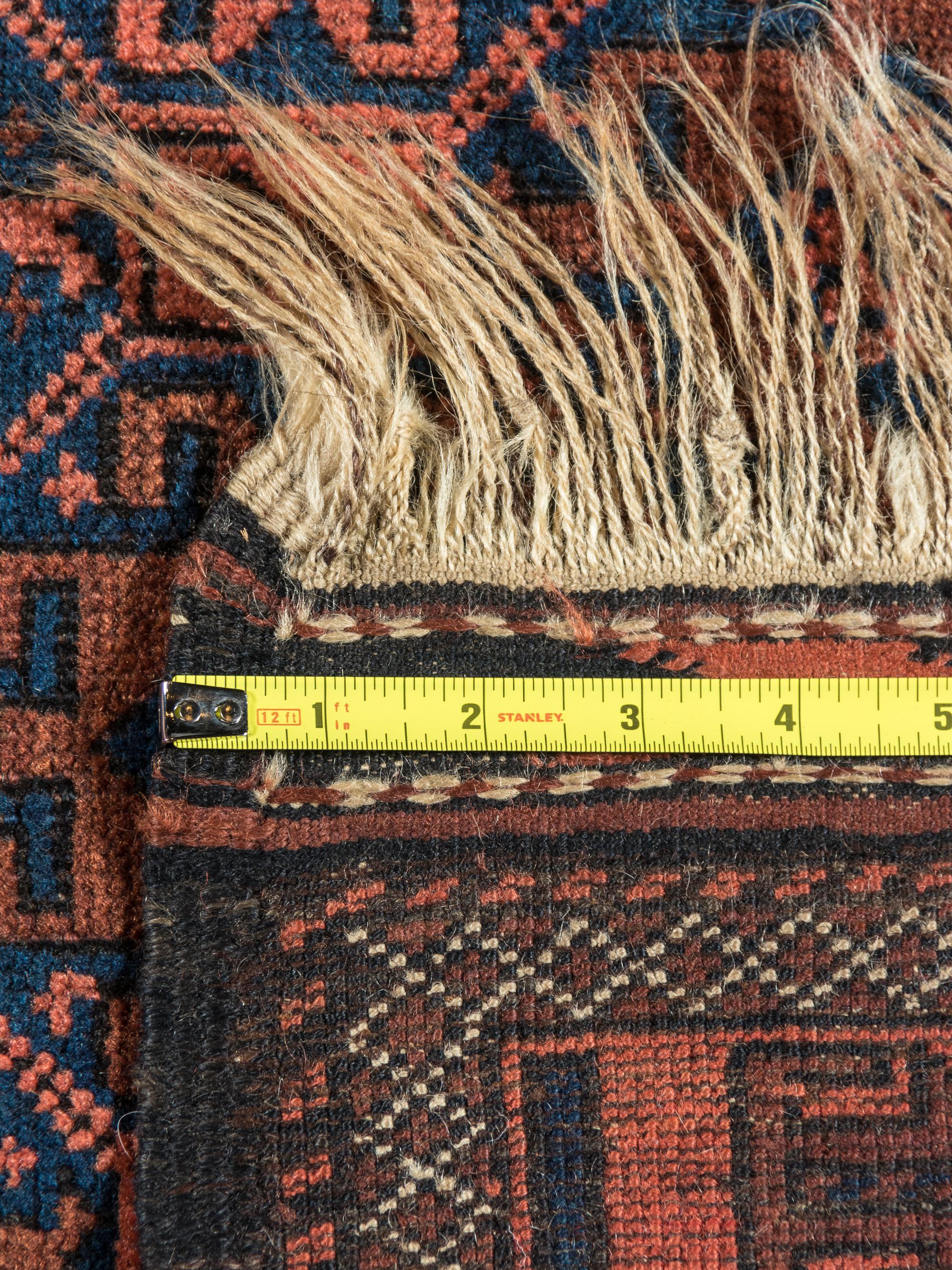 Five Wool Rugs