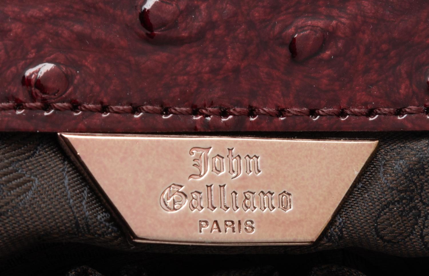 Five Assorted Designer Hand Bags: One Moschino, One Akris, One John Galliano, One Burberry, One Dolce & Gabbana