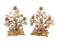 A Pair of Louis XV Style Gilt Bronze, Silvered Bronze and Porcelain Candelabra