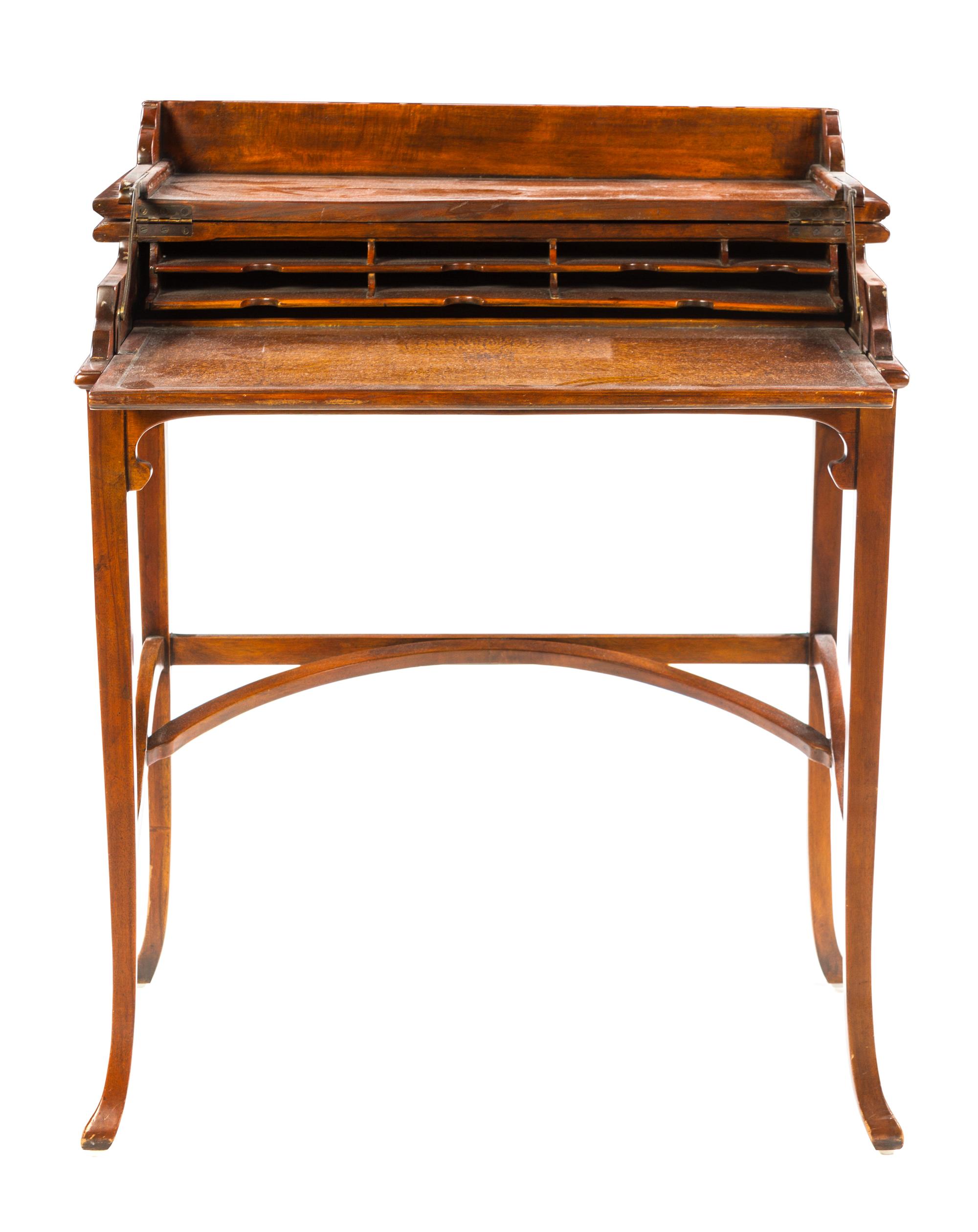 An English Mahogany Metamorphic Writing Table Height 31 x width 29 x depth 16 1/2 inches. — EARLY 20TH CENTURY